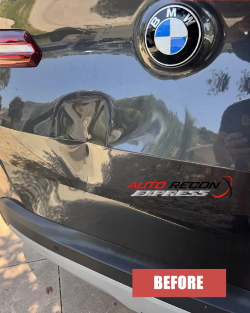 Before: Door ding removed with PDR